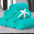 Turquoise Washcloths by VOOVAMOVAS